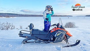 Катание на снегоходе на территории отдыха Sunset Beach